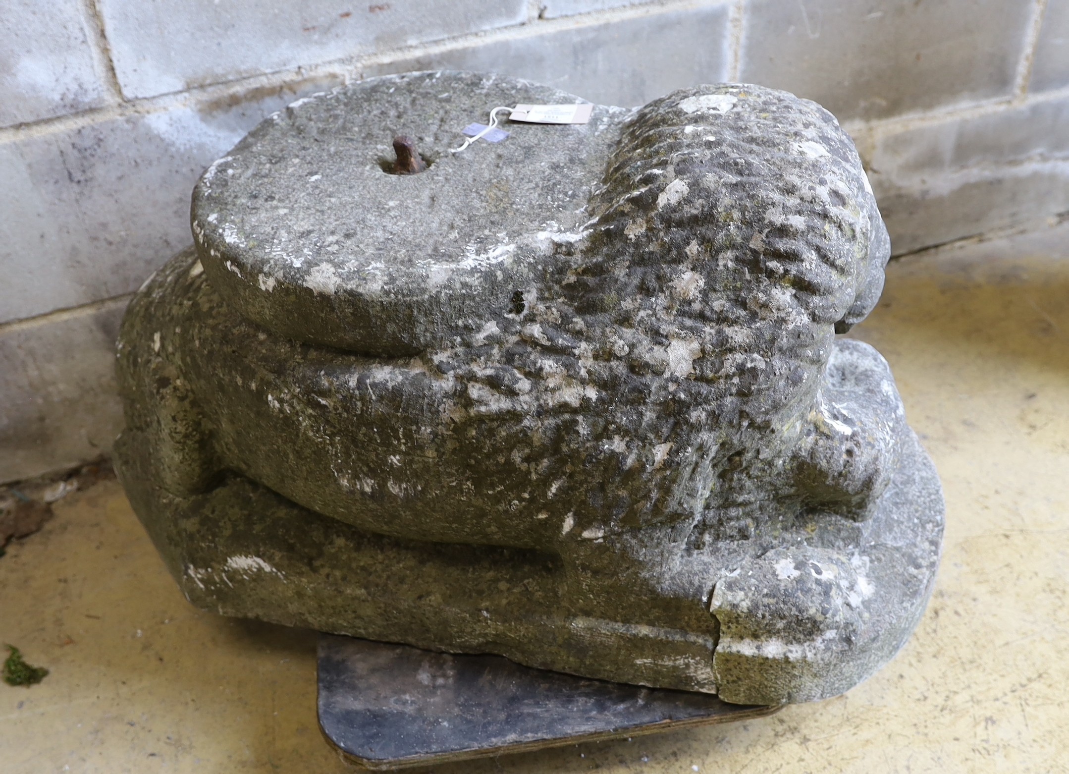 A carved stone lion, length 84cm, depth 40cm, height 45cm